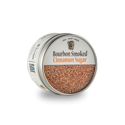Bourbon smoked cinnamon sugar tin with open lid showing brown sugar crystals