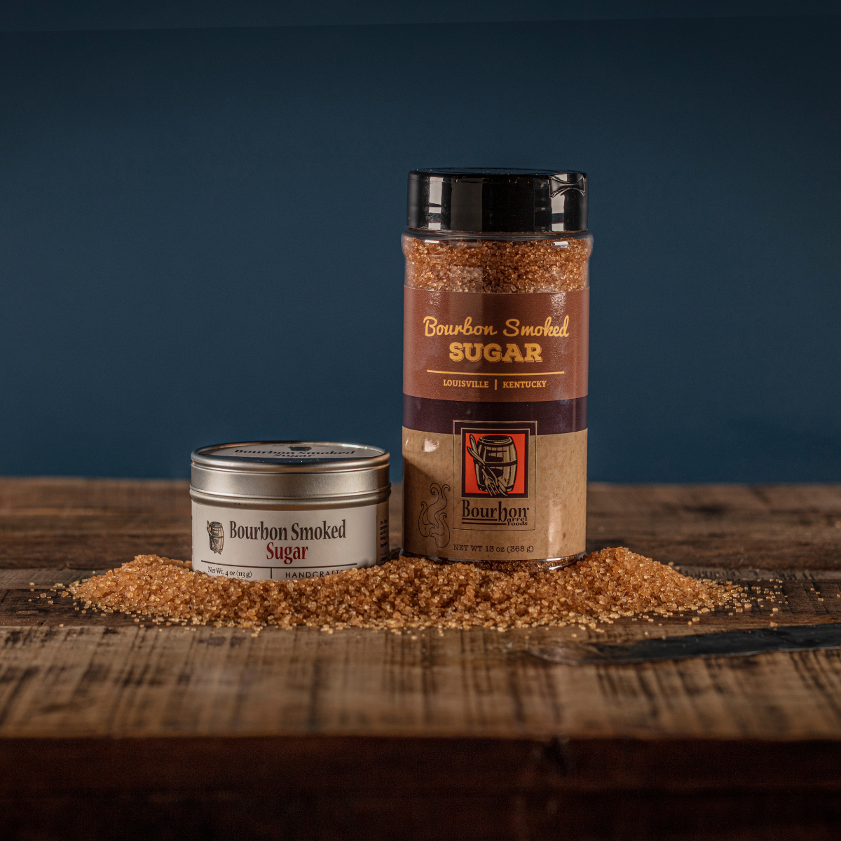 Smoked sugar shaker jar with brown sugar granules, black cap and label