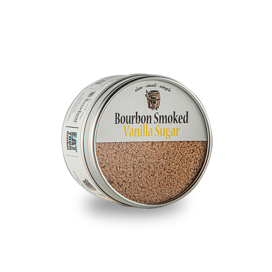 Smoked vanilla sugar tin with sugar granules visible in the front opening