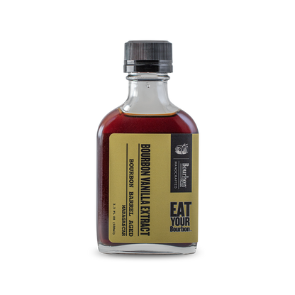 Bourbon-barrel aged vanilla extract bottle, amber liquid, black cap