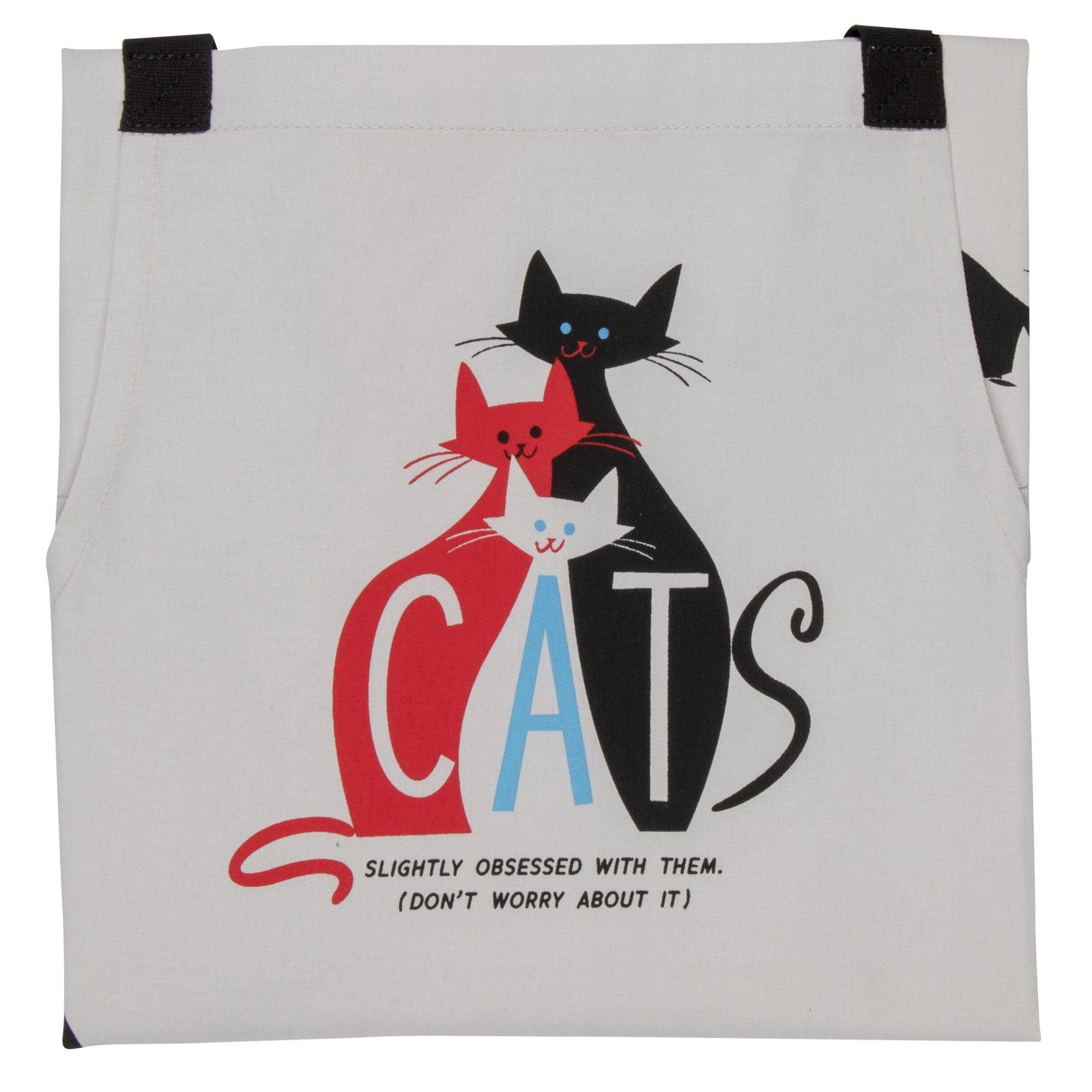 Close-up light gray apron pocket with large “CATS” cat logo and slogan
