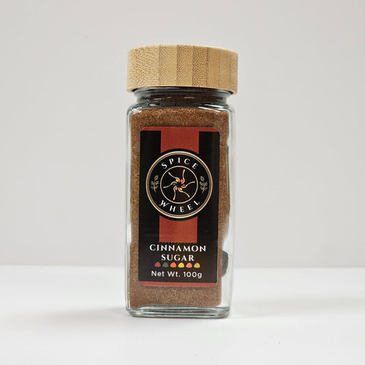 Cinnamon sugar spice blend in a glass jar with cork lid