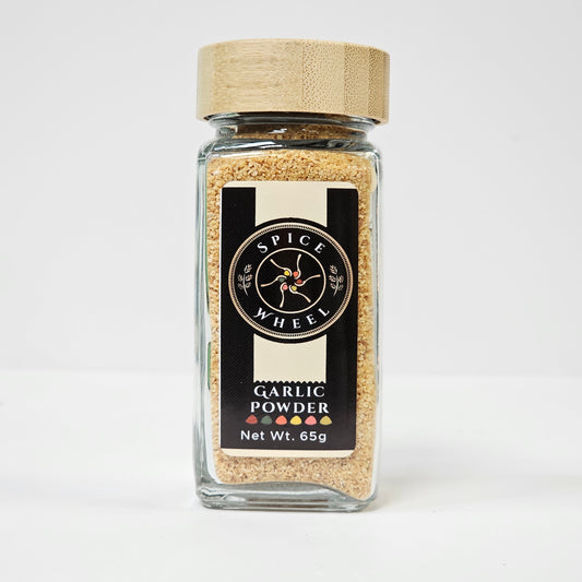Garlic powder jar with wooden lid, filled with pale ground powder.