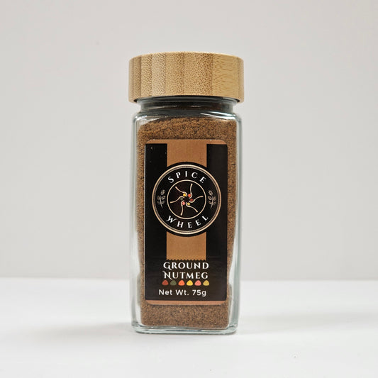 Ground nutmeg spice jar with beige lid and brown spice powder, Spice Wheel label