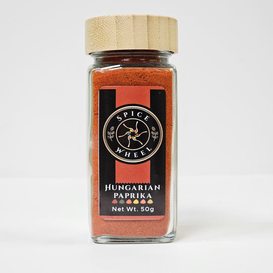 Paprika spice jar with red ground spice and black label, 50 g