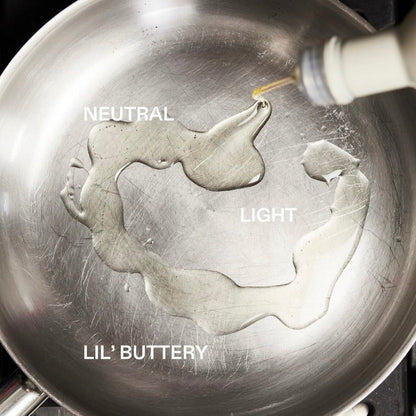 Algae cooking oil coating in a stainless skillet pan