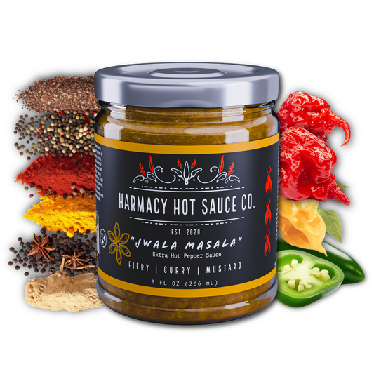 Hot curry mustard pepper sauce jar with metal lid and colorful spice accents