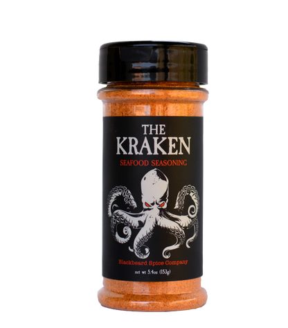 Kraken seasoning bottle with black label, white octopus logo, orange-brown rub
