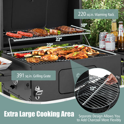 Charcoal grill with warming rack and two cooking grates holding grilled food