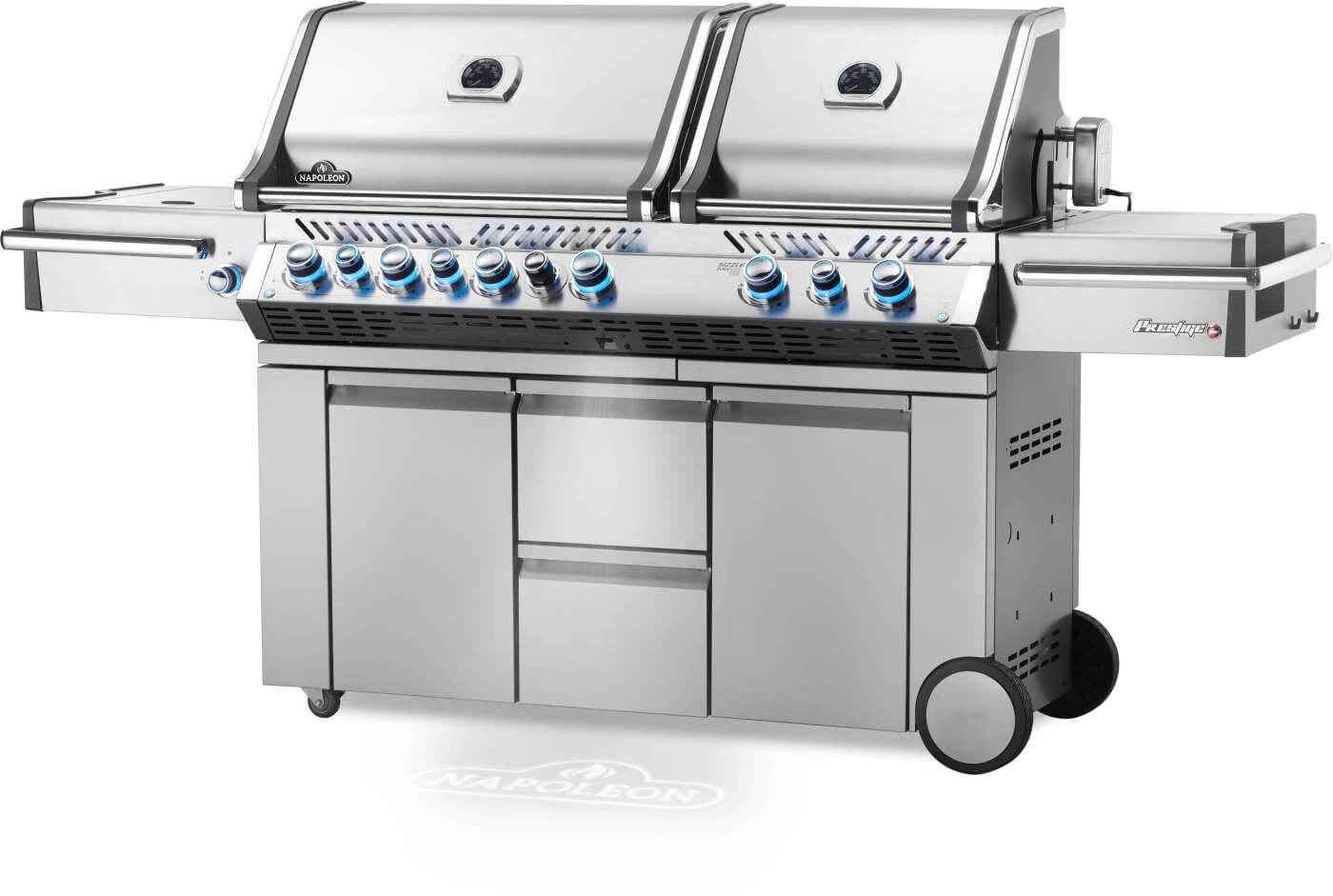 Stainless steel gas grill with control panel, side shelf, and cabinet doors