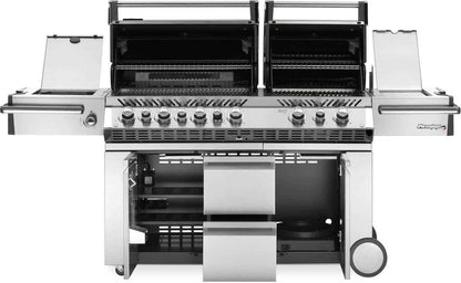 Open stainless steel gas grill with cooking grates and side control area