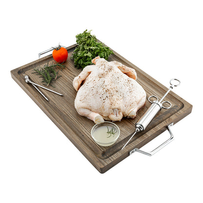 Stainless meat injector kit with injector tool, needles, and marinade dish on tray