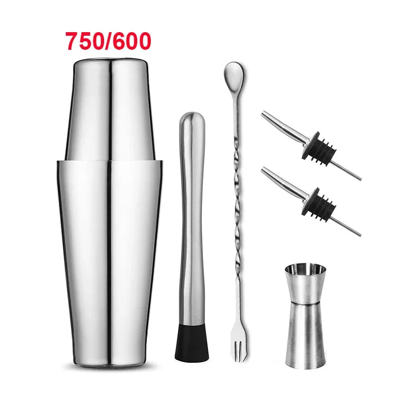 Stainless steel cocktail shaker set with shaker, jigger, bar spoon, and pour tools