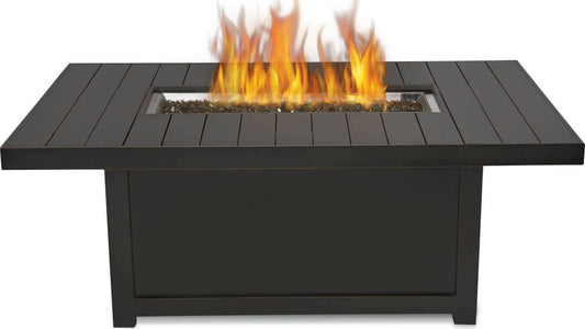 Rectangular outdoor fire table with open flame burner in dark tabletop