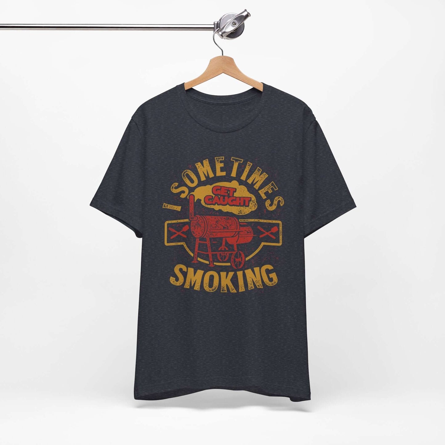 Graphic T-shirt in dark heather gray on a hanger, with front BBQ text graphic.