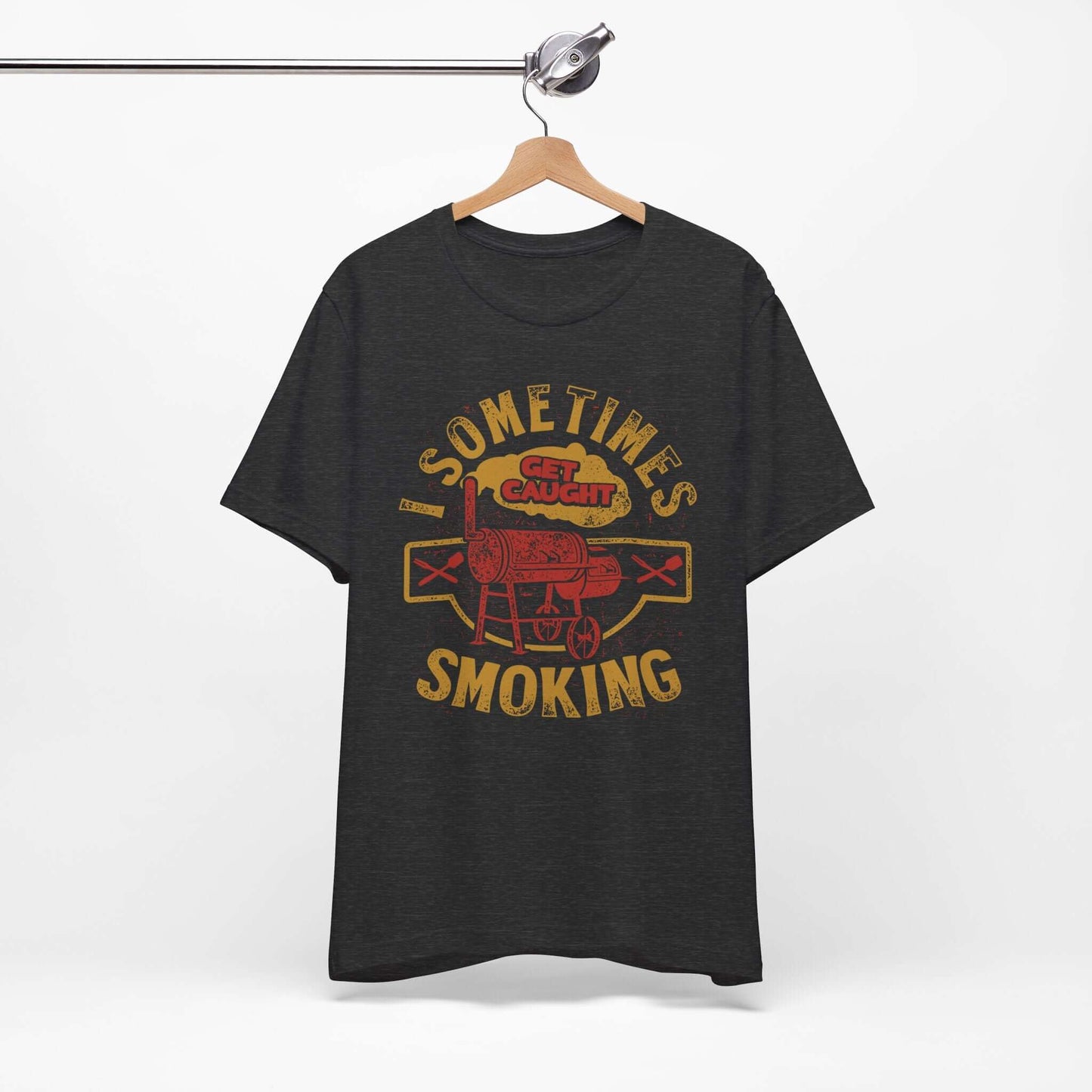 Dark grey heather T-shirt on hanger with front BBQ smoker graphic