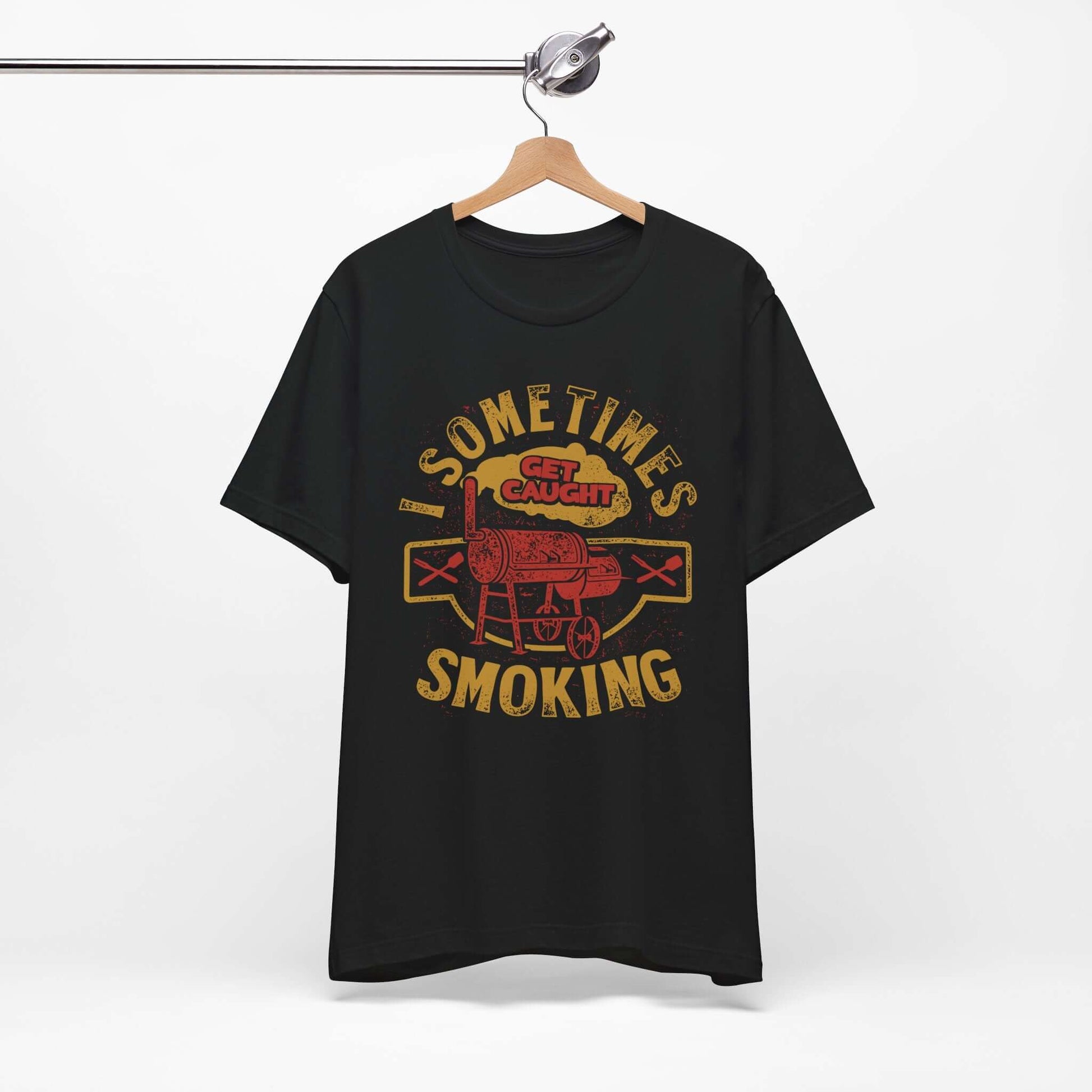 Graphic T-shirt in black on a hanger, with front BBQ text graphic.