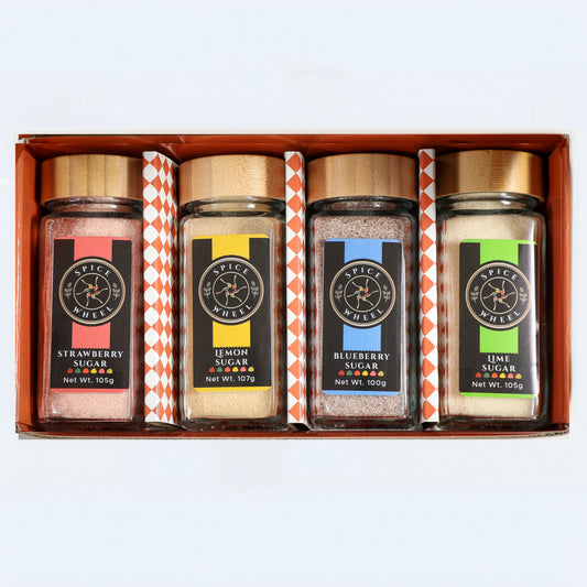 4 flavored sugar jars set with strawberry, lemon, blueberry, and lime labels