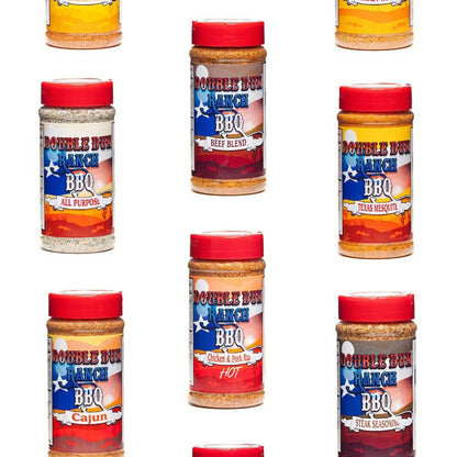 Variety of BBQ rub seasoning bottles with red caps: all purpose, beef blend, pork rub, chicken rub
