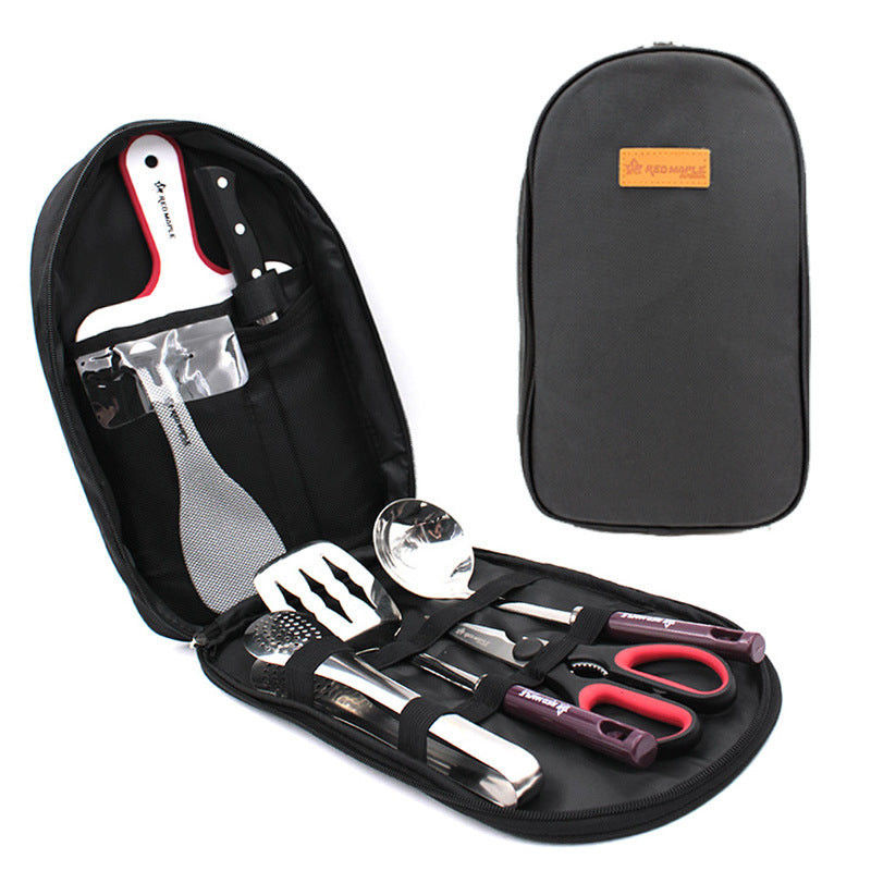 Outdoor BBQ tool set in black zippered case with utensils, grill fork, and scissors