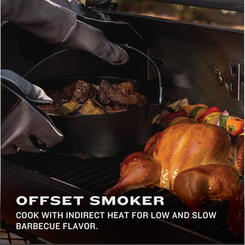 Offset smoker interior with grilled chicken, meat, and vegetables on cooking grate