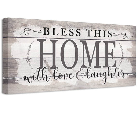 Stretched canvas wall art with “BLESs THIS HOME with love & laughter” in gray and black