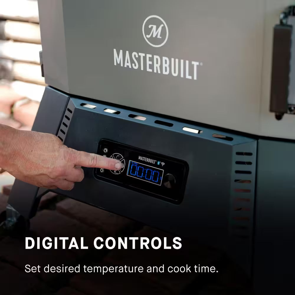 Digital charcoal smoker control panel with hand turning the temperature knob
