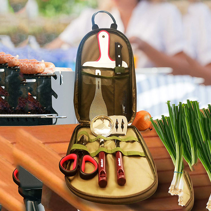 Outdoor BBQ tool set open in olive green case with stainless utensils and red-handled tools