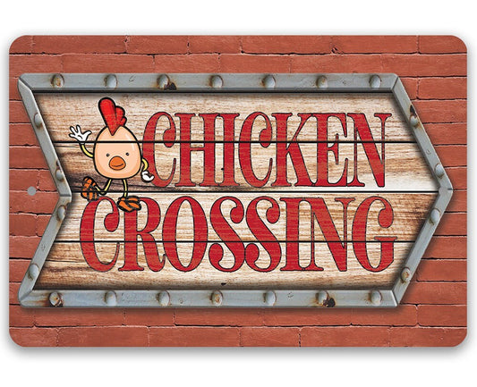 Chicken crossing metal sign with chicken graphic and bold red 'CHICKEN CROSSING' lettering