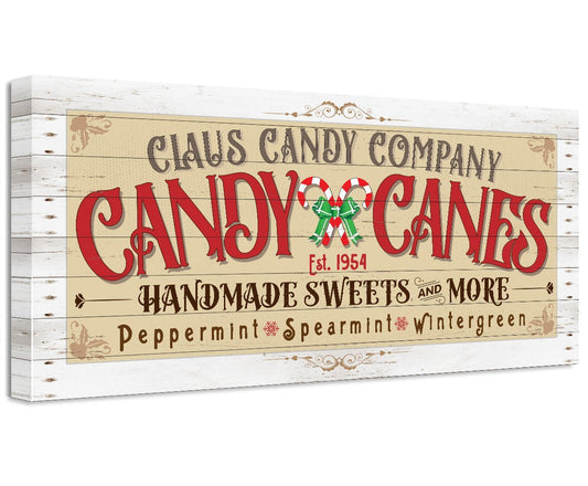 Candy cane artwork canvas with Claus Candy Company text and red ribbon candy cane icon