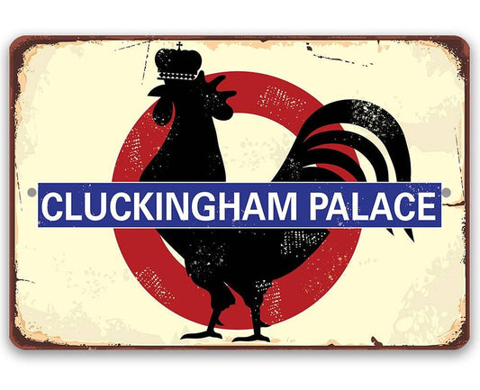 Cluckingham Palace metal sign with black rooster and crown in red circular emblem