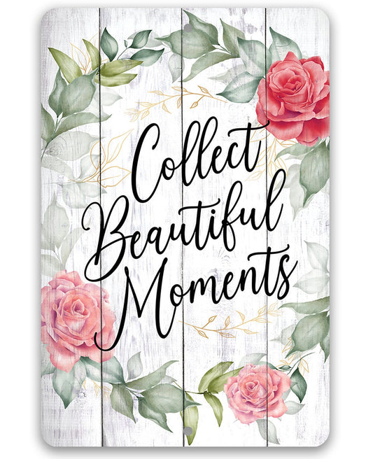 Metal wall sign with “Collect Beautiful Moments” script and pink roses with green leaves