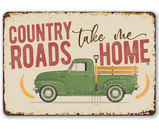 Country Roads metal sign with green truck and red “Take me home” lettering