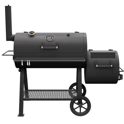Black offset barrel smoker with side firebox, cart wheels, and front grilling grate
