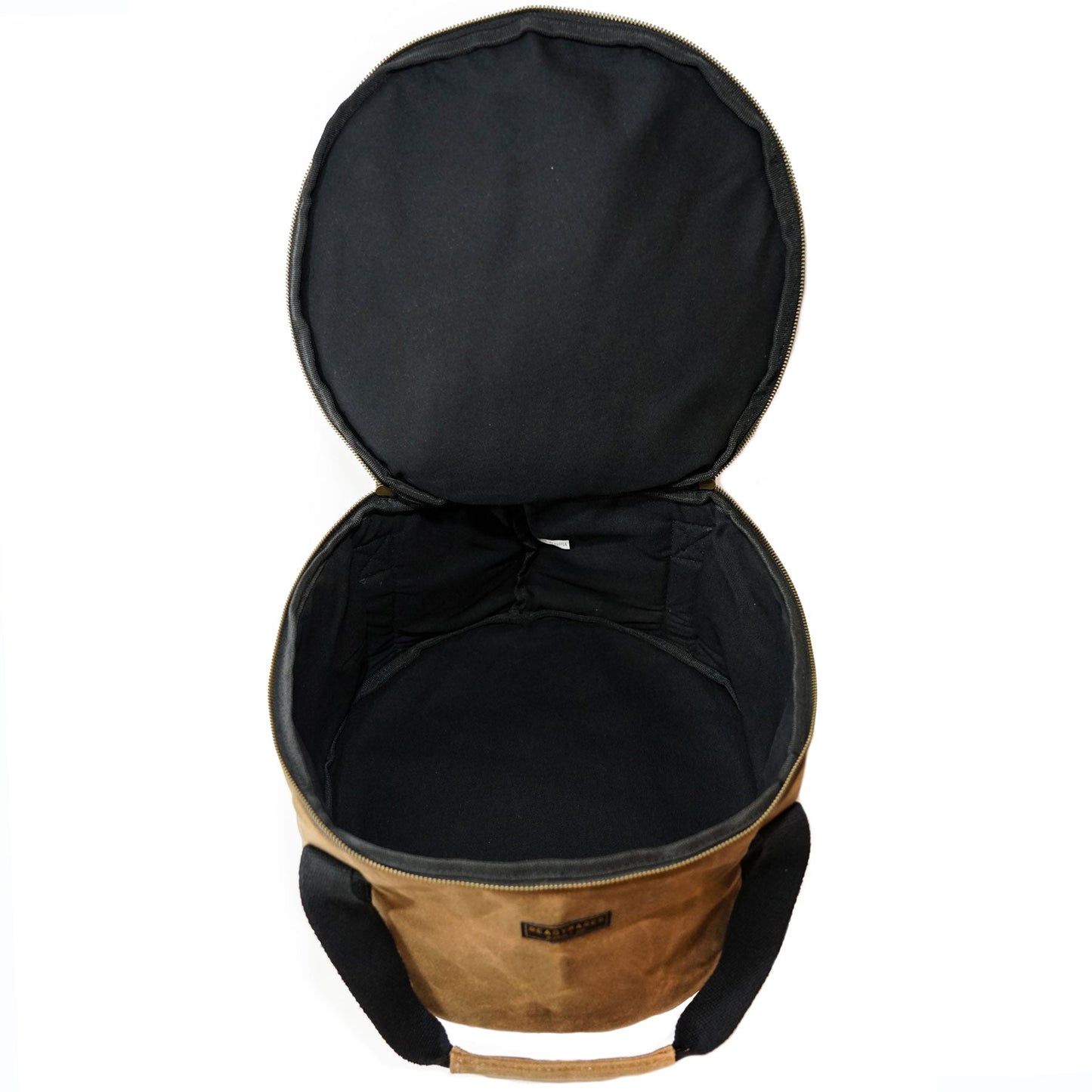 Dutch oven cover with open lid and black interior lining, tan outer fabric, zip
