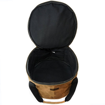 Dutch oven cover with open lid and black interior lining, tan outer fabric, zip