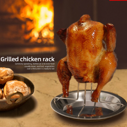 Stainless chicken roaster tray holding a whole roasted chicken on a rack