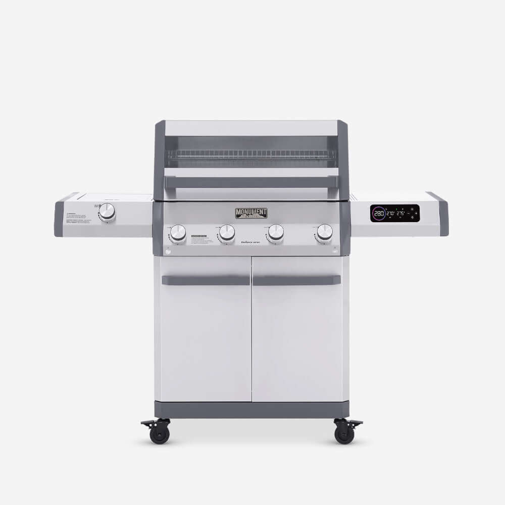 Stainless gas grill front view with control knobs, side shelves, and cabinet doors