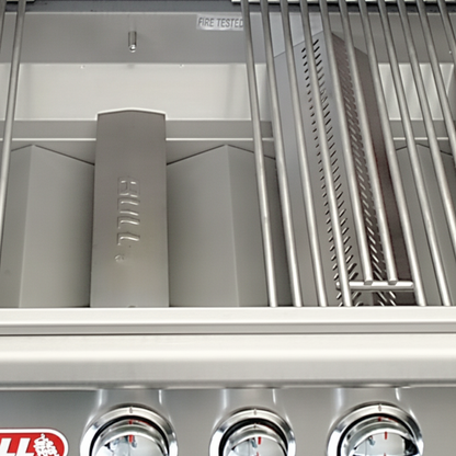 Stainless steel grill interior with burner tubes and open cooking grate