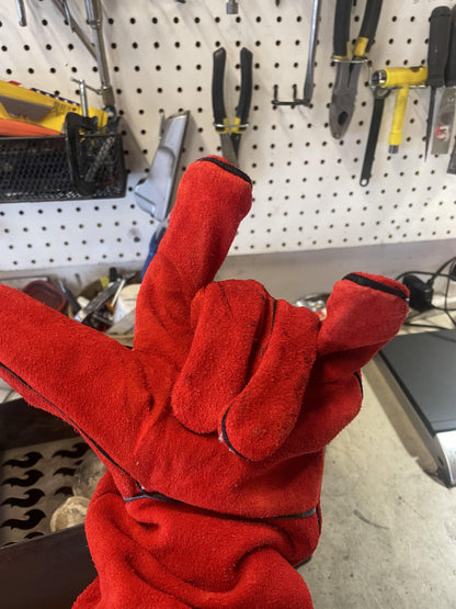 Red insulated campfire glove with thick cuff for handling hot grill parts