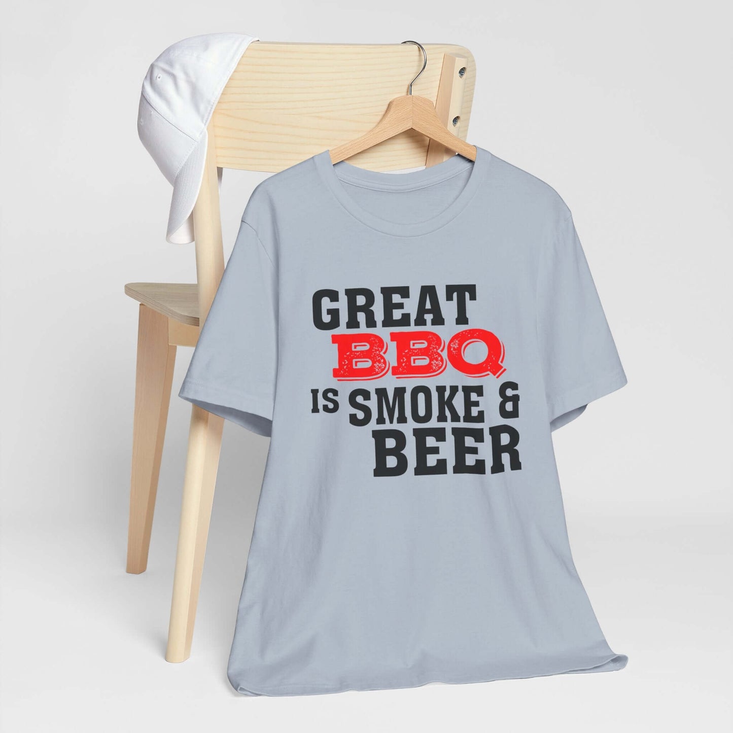 Light blue T-shirt with 'Great BBQ is smoke & beer' front graphic, short sleeves
