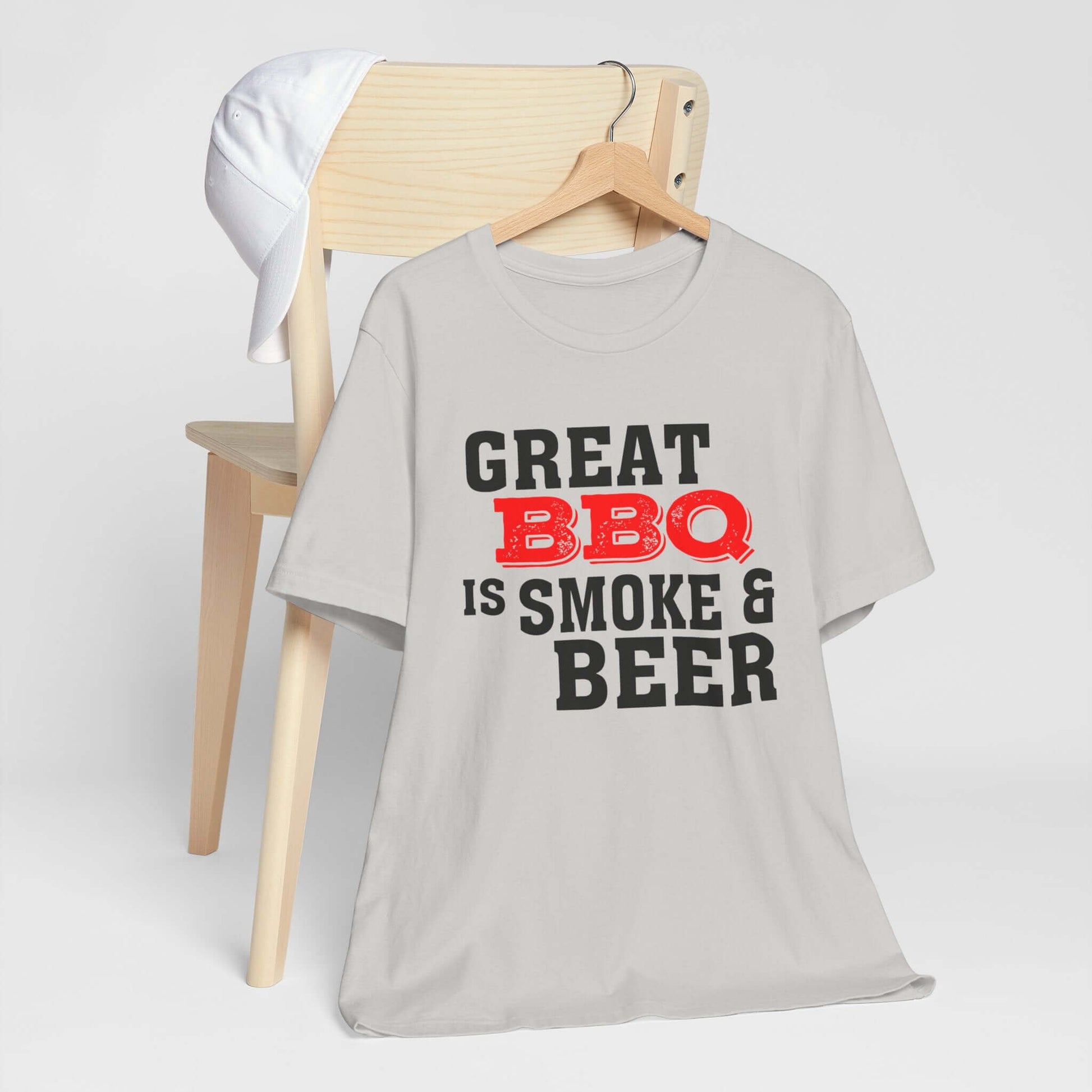 Grayish-white T-shirt with 'Great BBQ is smoke & beer' front graphic, short sleeves