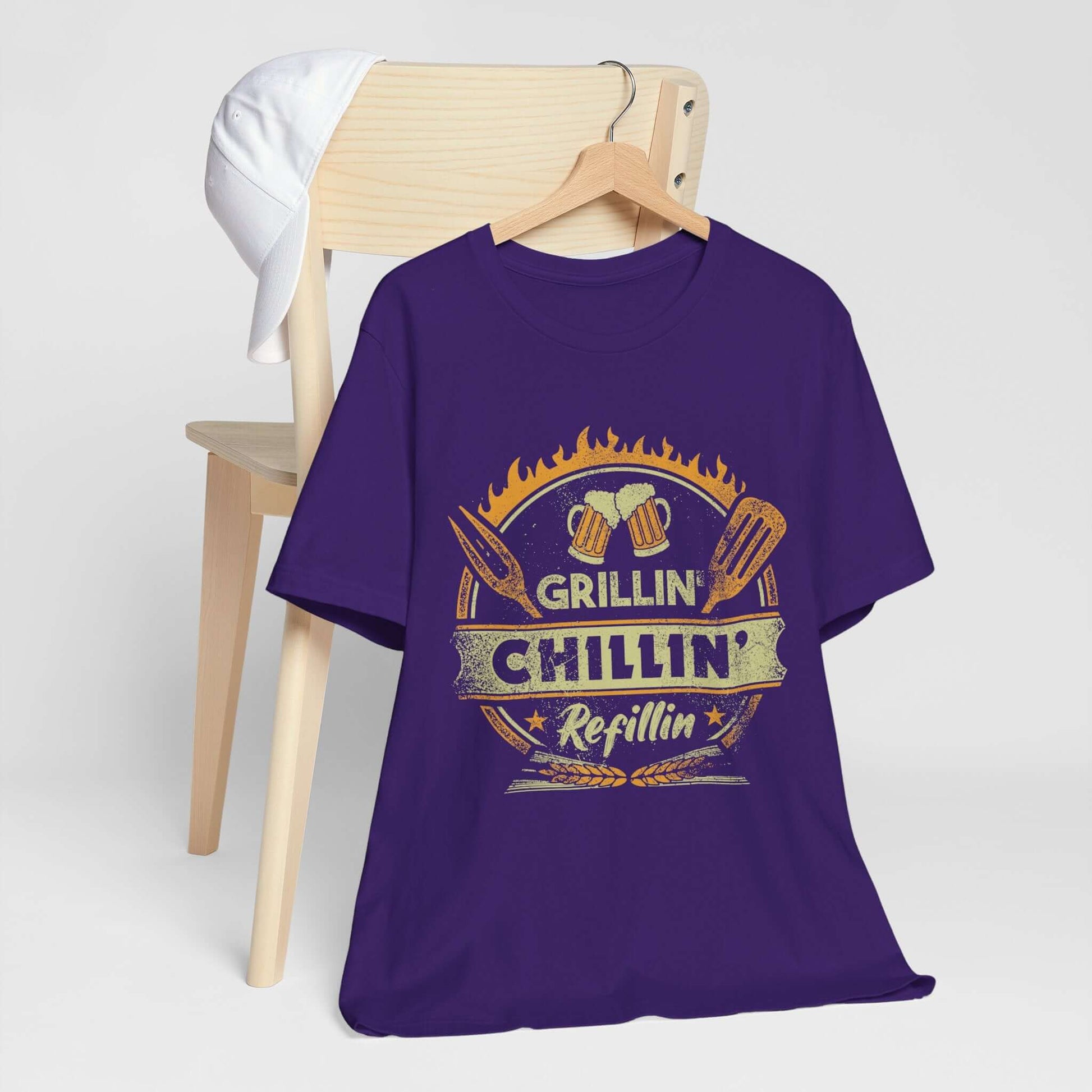Purple BBQ T-shirt with grill-themed “GRILLIN’ CHILLIN’ Refillin’” graphic