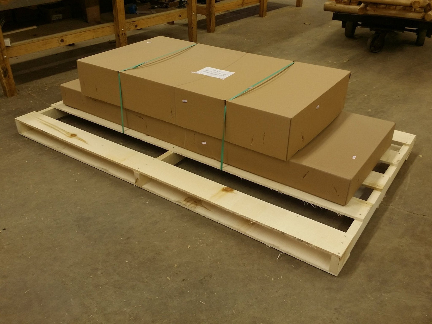 Cedar picnic table and bench set with light wood slat benches on pallet base