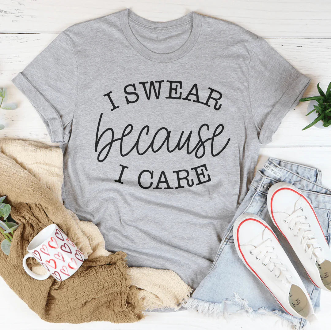Heather gray T-shirt with "I SWEAR because I CARE" graphic text, crew neck