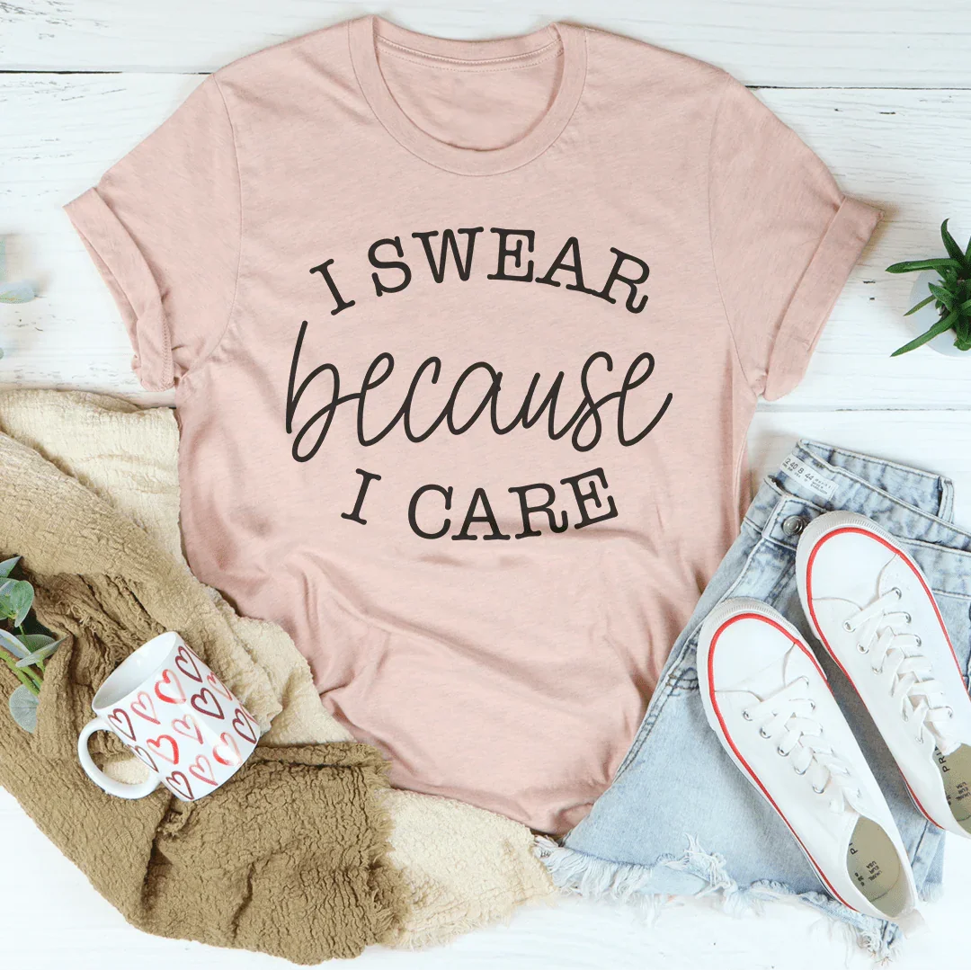 Soft mauve T-shirt with "I SWEAR because I CARE" graphic text, crew neck