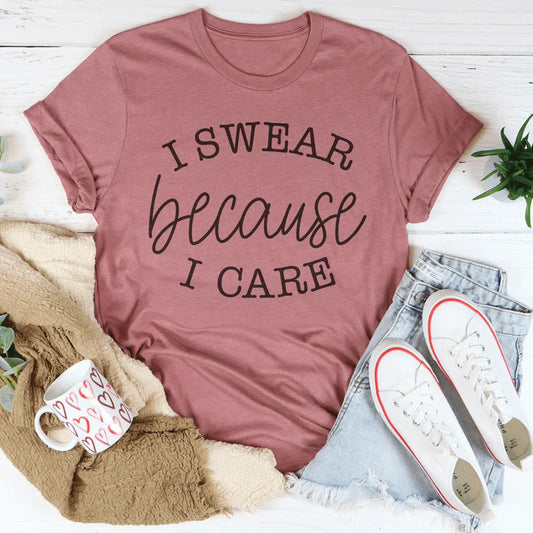 Mauve T-shirt with "I SWEAR because I CARE" graphic text, crew neck