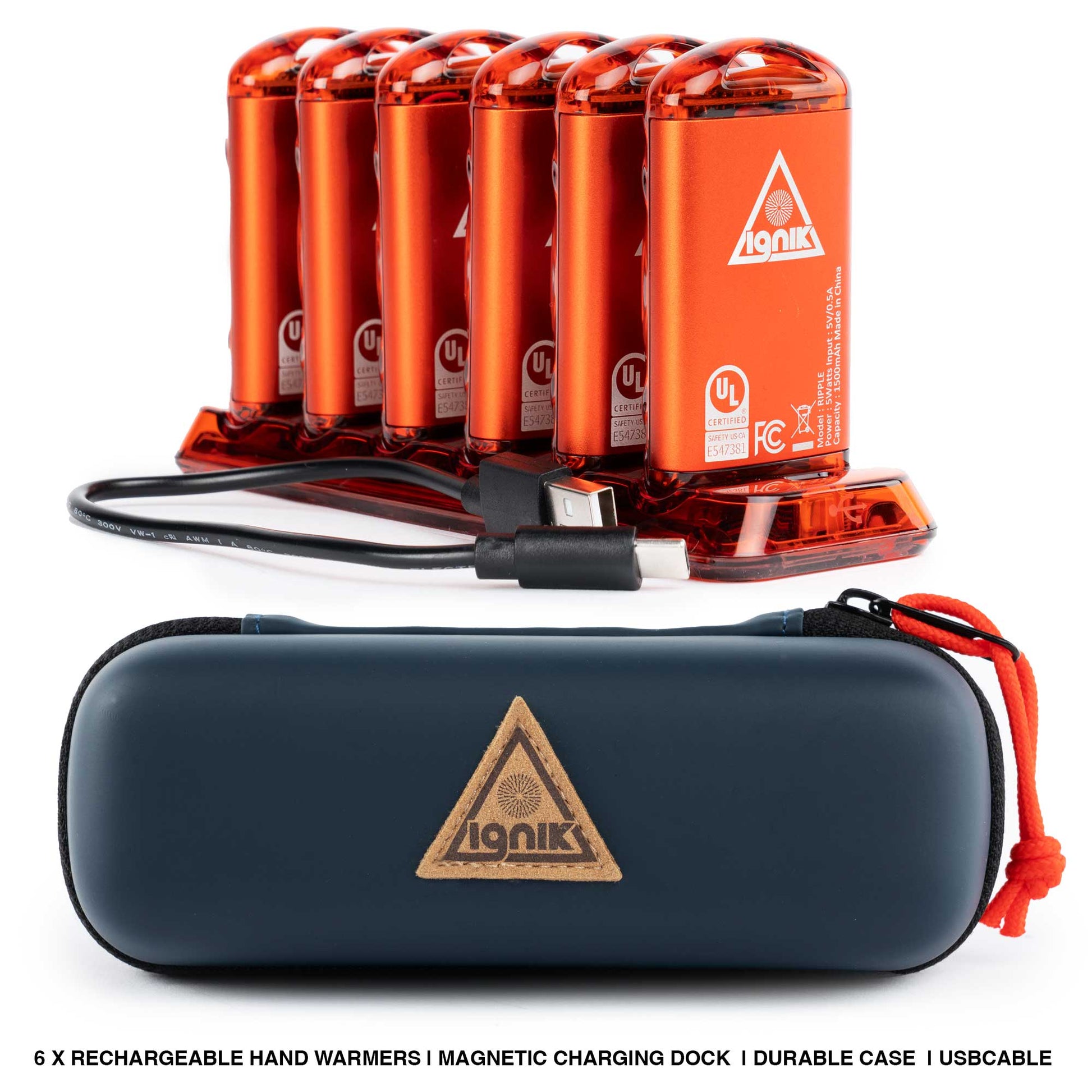 Lava orange hand warmers on magnetic charging dock with navy storage case and cable