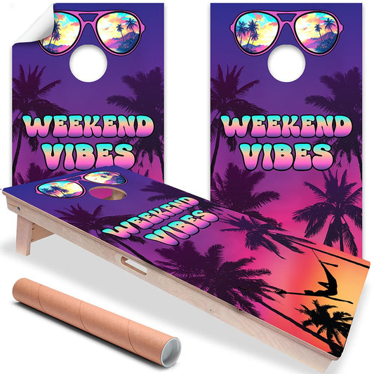 Purple/pink cornhole board wraps with palm-sunset and sunglasses graphic, 'WEEKEND VIBES'