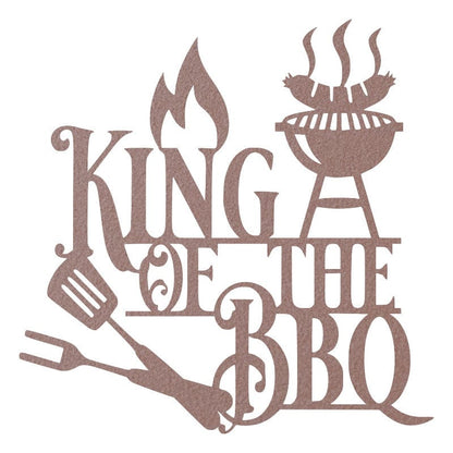 Rose gold King of the BBQ metal wall sign with flame, grill, and grilling utensil shapes